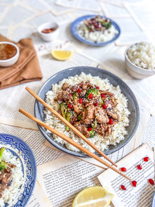 Sesame chicken with pomegranate and ginger rice