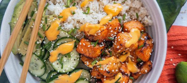 Spicy Salmon Bowls with Avocado, Cucumber, and Coconut Rice